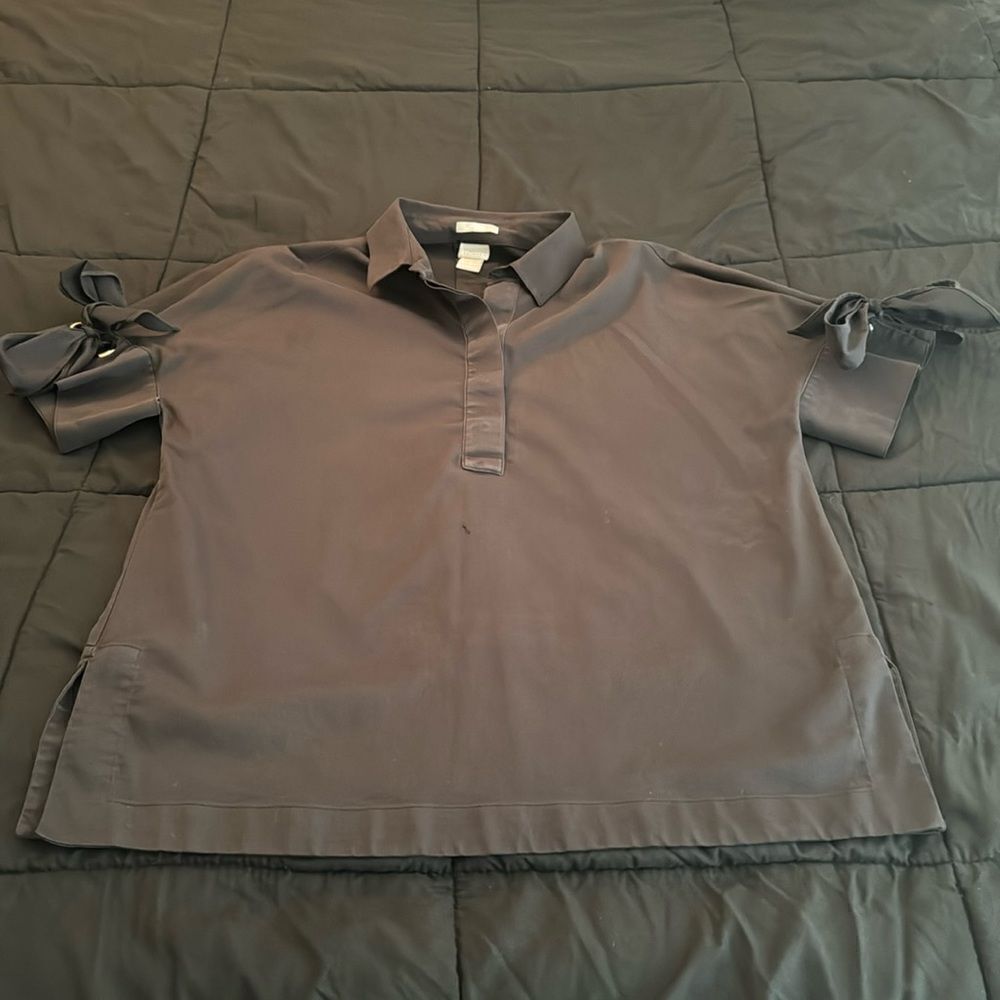 Chico’s Black Collared Shirt. Size 2. Bows on the sleeves.No Iron Chic Stretch.